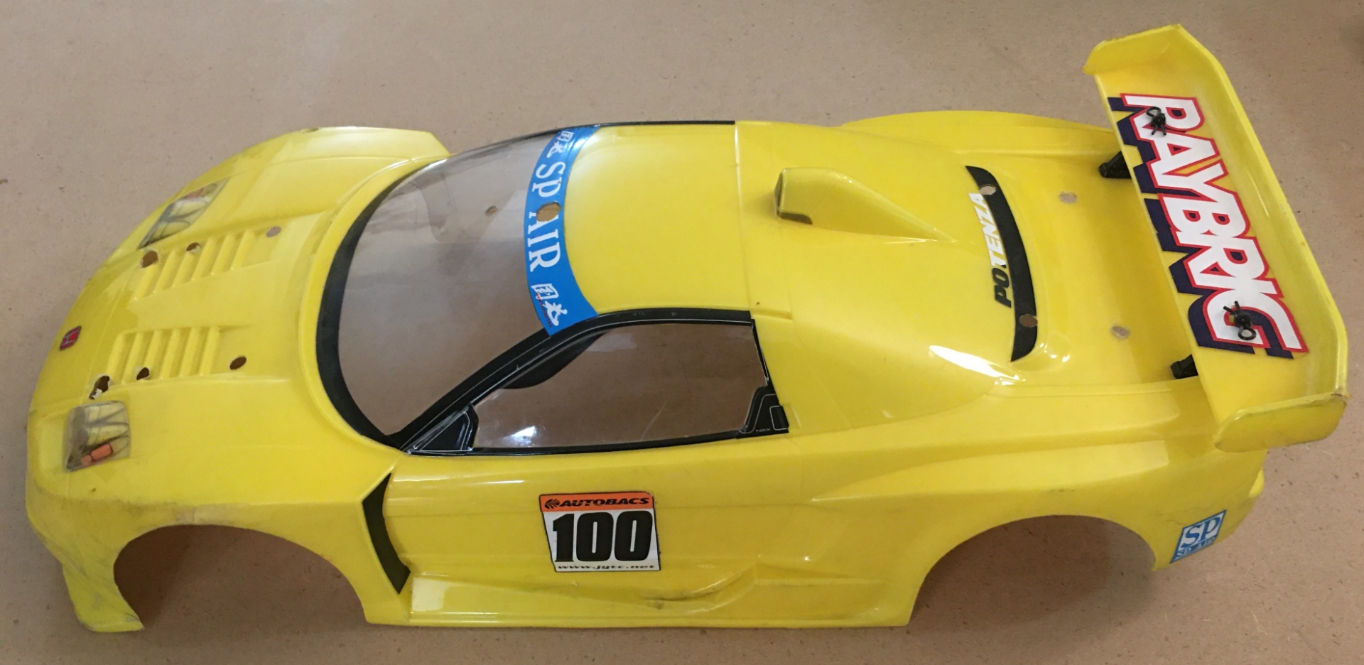GoRC Canada. Tamiya TA05 Raybrig Yellow 1/10 Body (refurb)